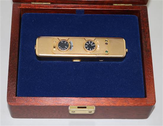 A Minox LX gold plated camera No.232/999 with original paperwork and box